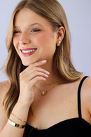 Brinco de gota dourado